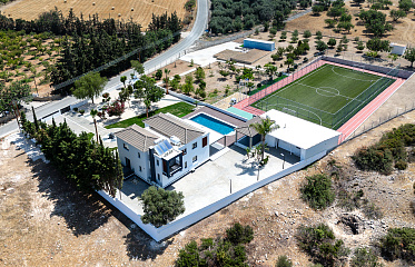 Technology, sports, and privacy: a new-generation villa with a soccer field in Cyprus